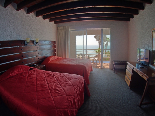 Imagen de la habitación del Hotel Las Rocas Resort and Spa. Foto 6