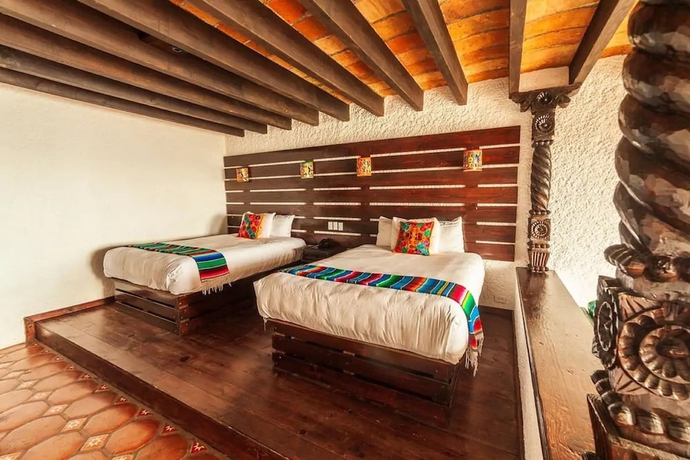 Imagen de la habitación del Hotel Las Rocas Resort and Spa. Foto 9