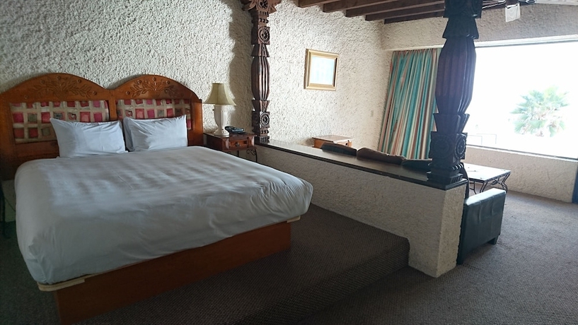 Imagen de la habitación del Hotel Las Rocas Resort and Spa. Foto 13