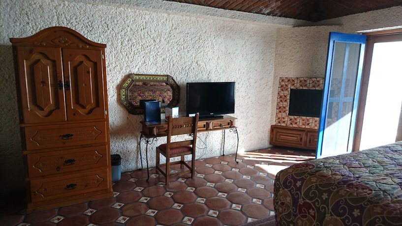 Imagen de la habitación del Hotel Las Rocas Resort and Spa. Foto 15