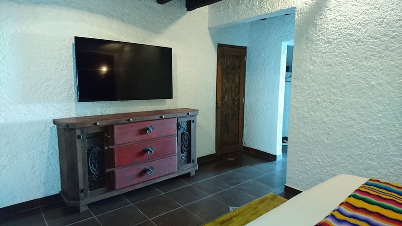 Imagen de la habitación del Hotel Las Rocas Resort and Spa. Foto 16