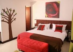 Imagen de la habitación del Hotel Las Rosas Boutique. Foto 2