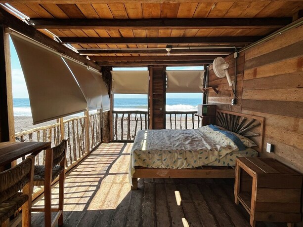 Imagen de la habitación del Hotel Las delicias del paraiso. Foto 19