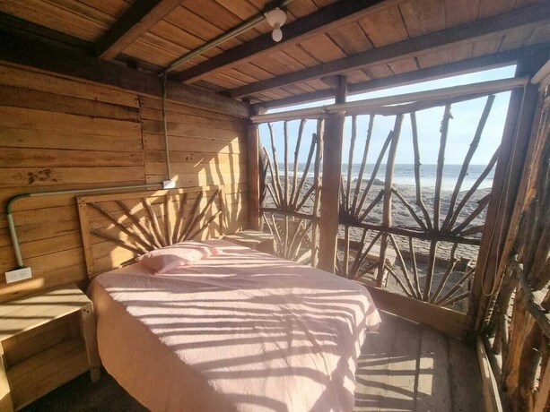 Imagen de la habitación del Hotel Las delicias del paraiso. Foto 20