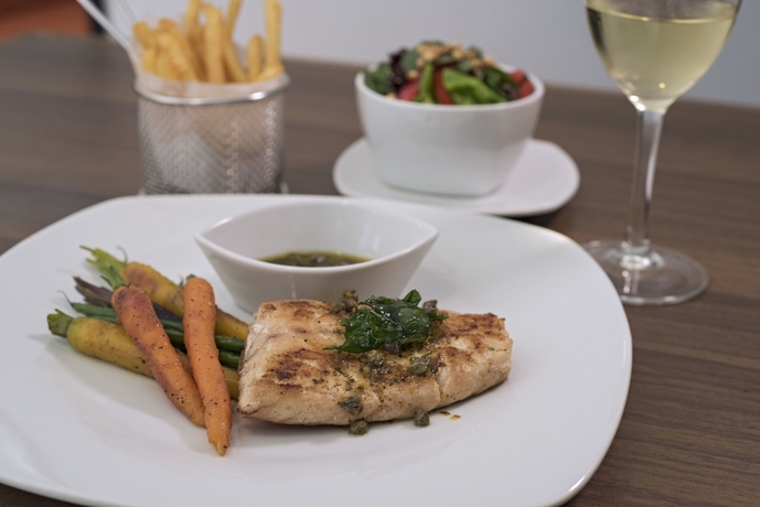 Imagen del bar/restaurante del Hotel Latam Plaza Pradera Quetzaltenango. Foto 4