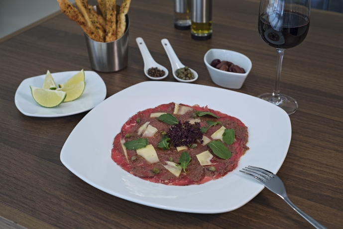 Imagen del bar/restaurante del Hotel Latam Plaza Pradera Quetzaltenango. Foto 5