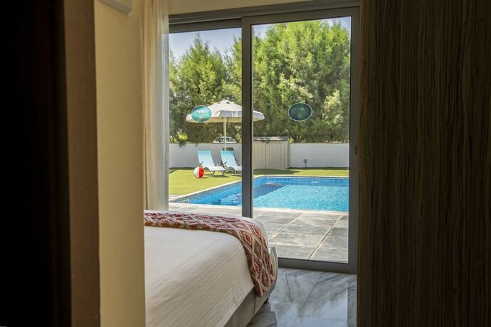 Imagen de la habitación del Hotel Latchi Escape And Suites. Foto 19