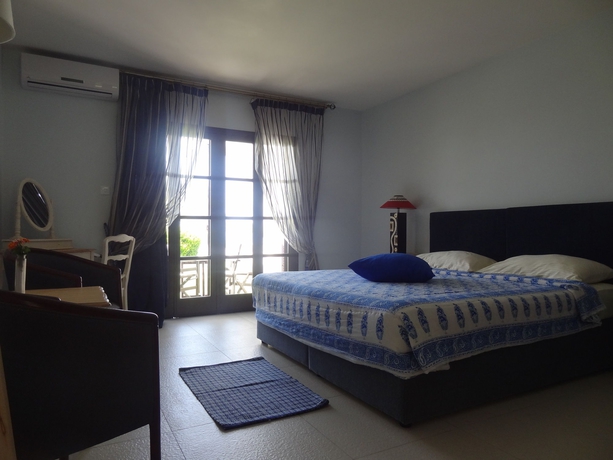 Imagen de la habitación del Hotel Latchi Family Resort. Foto 8