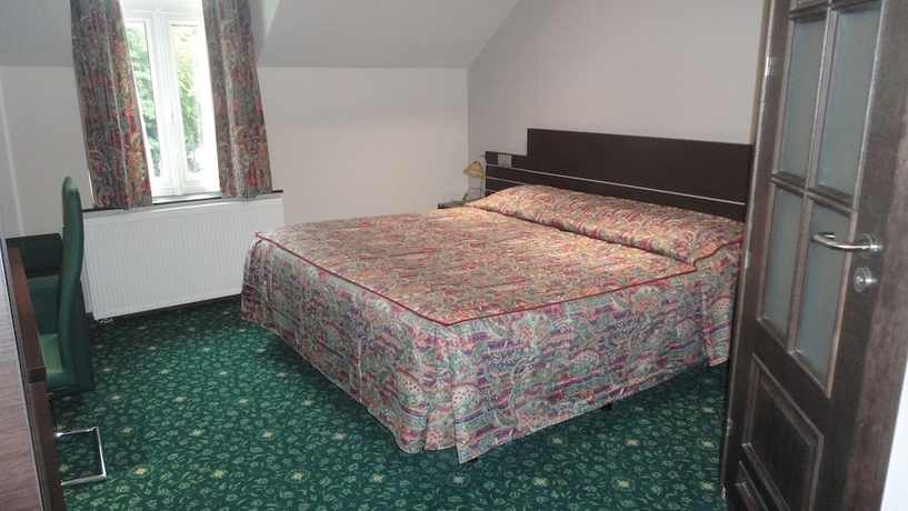 Imagen de la habitación del Hotel L'auberge Du Souverain. Foto 3