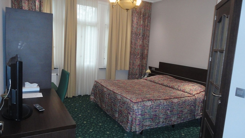 Imagen de la habitación del Hotel L'auberge Du Souverain. Foto 4