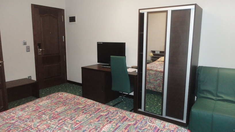 Imagen de la habitación del Hotel L'auberge Du Souverain. Foto 6