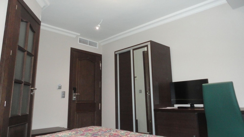 Imagen de la habitación del Hotel L'auberge Du Souverain. Foto 13