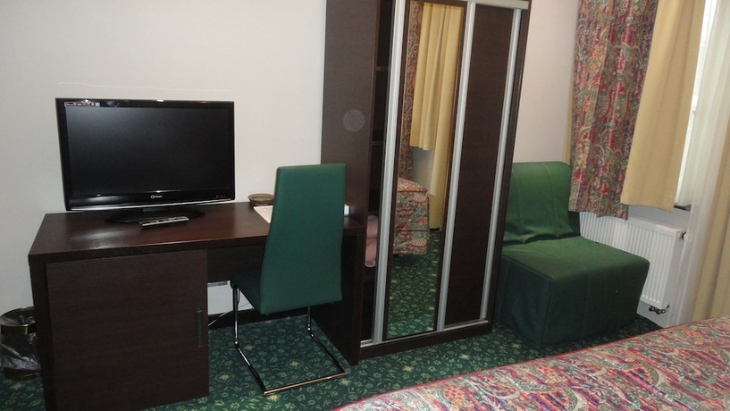 Imagen de la habitación del Hotel L'auberge Du Souverain. Foto 14