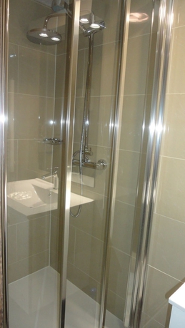 Imagen de la habitación del Hotel L'auberge Du Souverain. Foto 15