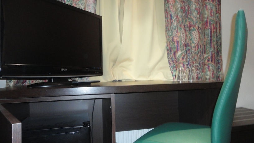 Imagen de la habitación del Hotel L'auberge Du Souverain. Foto 18