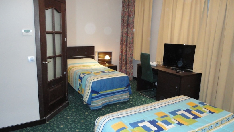 Imagen de la habitación del Hotel L'auberge Du Souverain. Foto 19