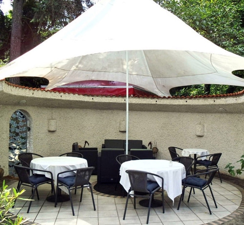 Imagen de los exteriores del Hotel L'auberge, Walldorf. Foto 12
