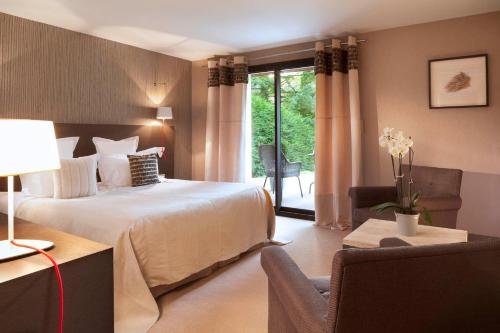 Imagen de la habitación del Hotel L'aubinière. Foto 4