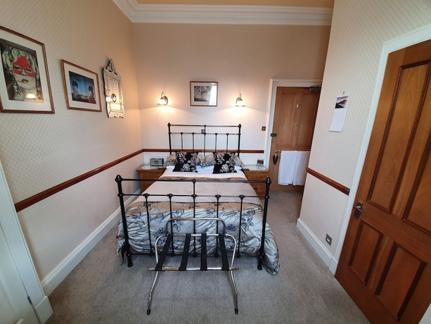 Imagen de la habitación del Hotel Lauderville Guest House. Foto 6