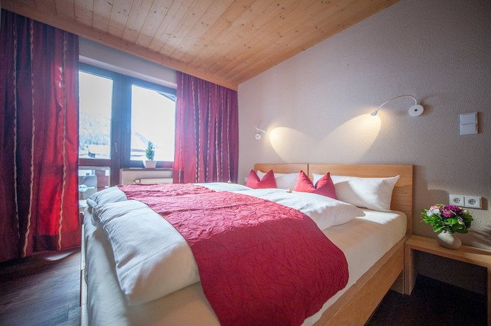 Imagen de la habitación del Hotel L&auml;rchenhof - Premium Apartments and Zimmer. Foto 8