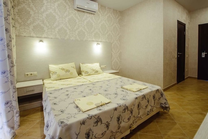 Imagen de la habitación del Hotel Laura Guest House, L&aacute;zarevskoye. Foto 10