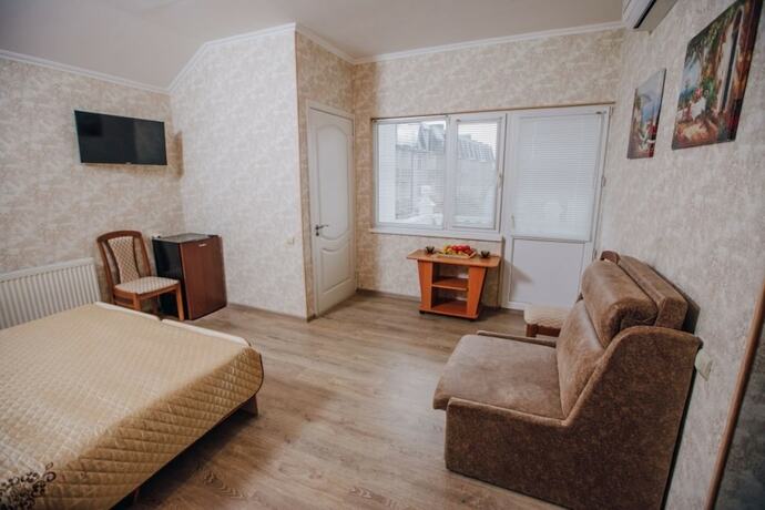 Imagen de la habitación del Hotel Laura Guest House, Sochi. Foto 18