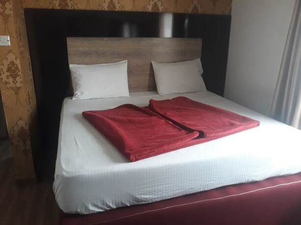 Imagen de la habitación del Hotel Laurel Blue Suites. Foto 13