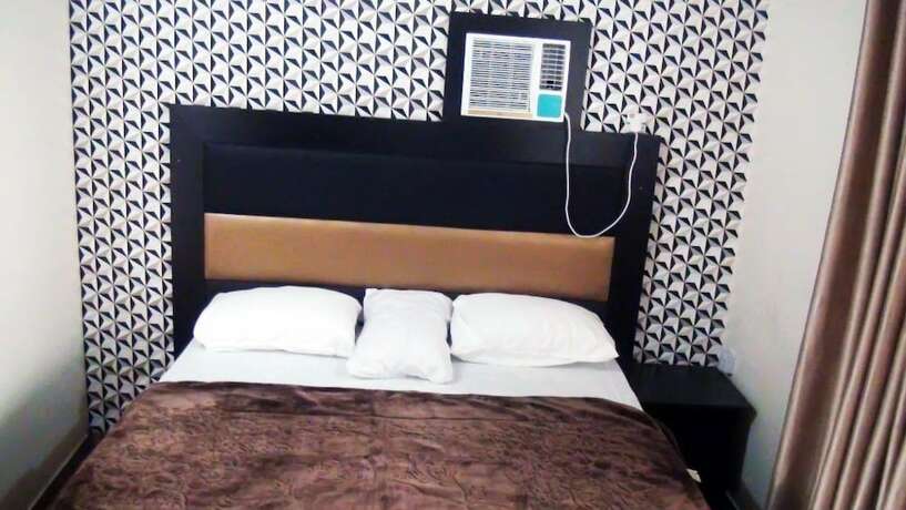 Imagen de la habitación del Hotel Laurel Blue Suites. Foto 15