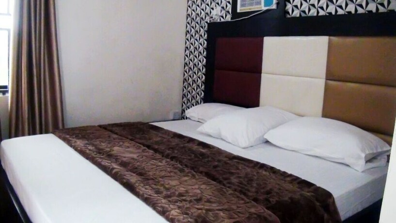 Imagen de la habitación del Hotel Laurel Blue Suites. Foto 18