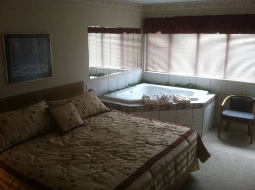 Imagen de la habitación del Hotel Laurel Inn Condominium. Foto 13