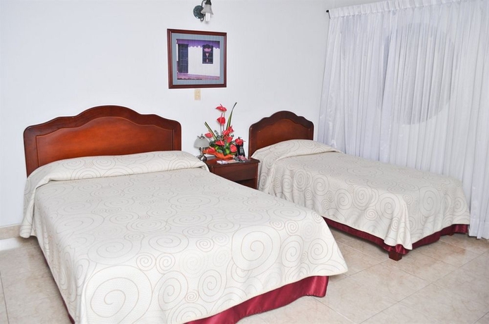 Imagen de la habitación del Hotel Laureles 70. Foto 7