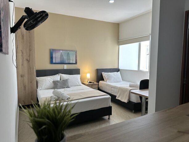 Imagen de la habitación del Hotel Laureles Grand House LGH. Foto 16