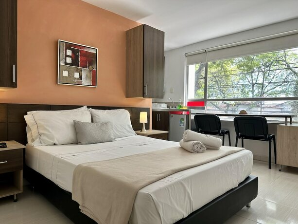 Imagen de la habitación del Hotel Laureles Guest House. Foto 20