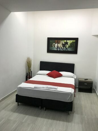 Imagen de la habitación del Hotel Laureles de Aburra Medellin. Foto 4