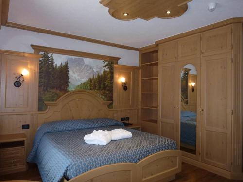 Imagen de la habitación del Hotel Laurino, Pozza di Fassa. Foto 7