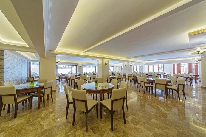 Imagen del bar/restaurante del Hotel Lausos Palace. Foto 2