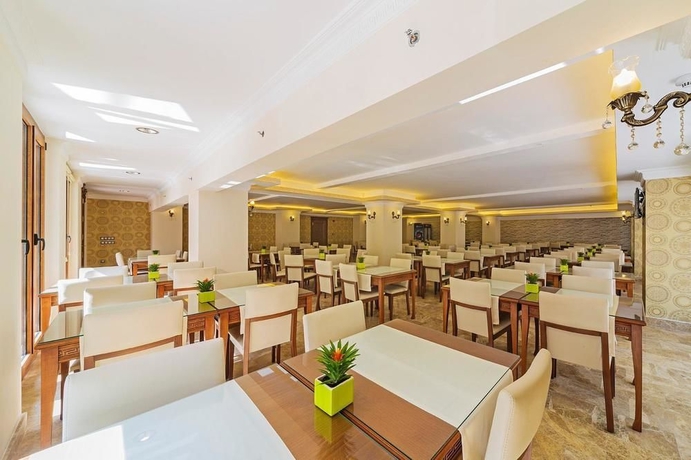 Imagen del bar/restaurante del Hotel Lausos Palace. Foto 4