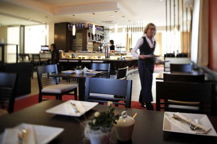Imagen del bar/restaurante del Hotel Lava Inn. Foto 3