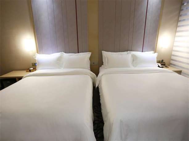 Imagen de la habitación del Hotel Lavande Gz Huangpu Avenue Branch. Foto 4