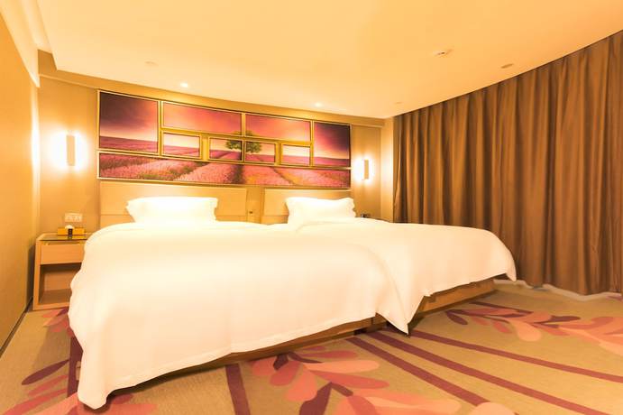 Imagen de la habitación del Hotel Lavande Hotel Qingdao Wusi Plaza Branch. Foto 7