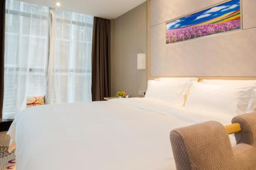 Imagen de la habitación del Hotel Lavande Zhujiang Xincheng Station. Foto 8
