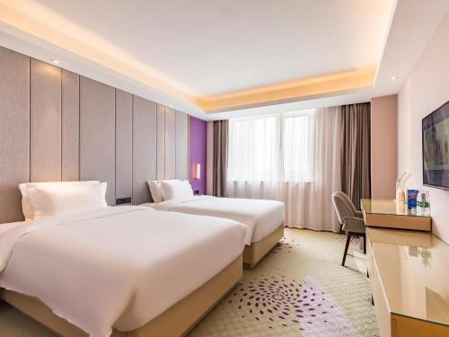 Imagen de la habitación del Hotel Lavede Sanhe Yanjiao Tianyang Plaza. Foto 17