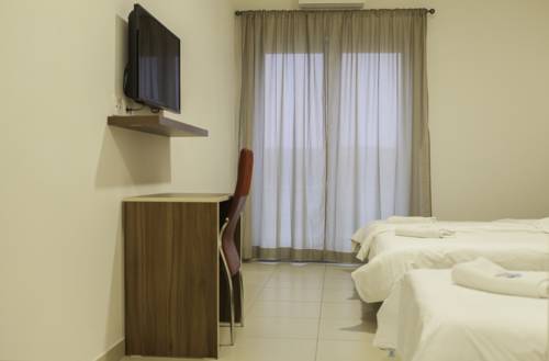 Imagen de la habitación del Hotel Lavender - Oleander Resort. Foto 11