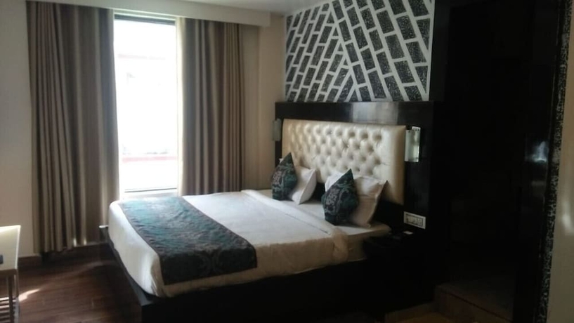 Imagen de la habitación del Hotel Lavish Inn. Foto 4