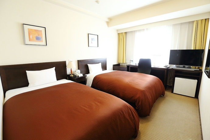 Imagen de la habitación del Hotel Laxio-inn. Foto 11