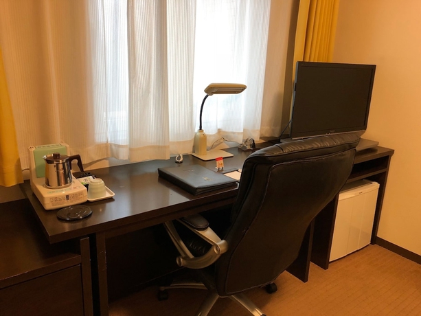 Imagen de la habitación del Hotel Laxio-inn. Foto 12