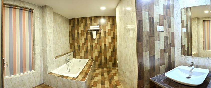 Imagen de la habitación del Hotel Laxmi Empire. Foto 8
