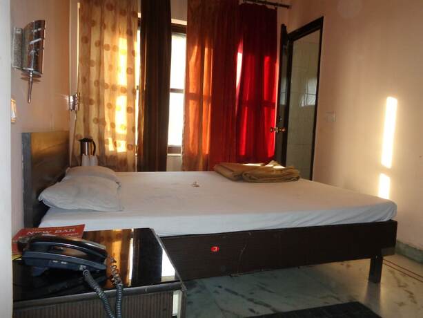 Imagen de la habitación del Hotel Laxmi Palace, Dehradun. Foto 20