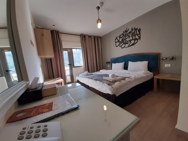 Imagen de la habitación del Hotel Layaali Amman. Foto 10