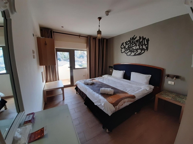 Imagen de la habitación del Hotel Layaali Amman. Foto 14